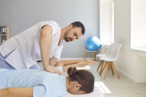 Chiropractic adjustment of a woman