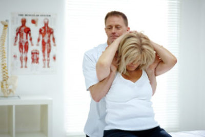 Mild discomfort after a chiropractor adjustment, lady getting her neck and back adjusted